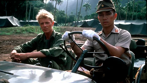 BFI Bowie brought a subversive edge to his role as a soldier in a Japanese prison camp in 1983 film Merry Christmas, Mr Lawrence (Credit: BFI)