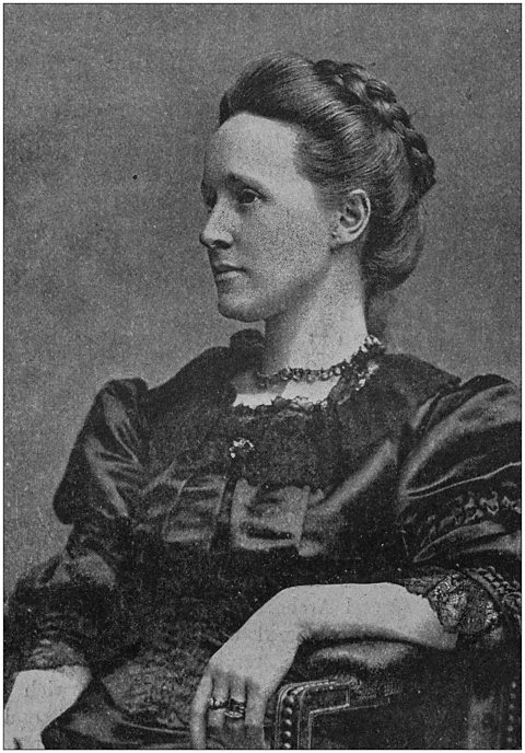 A black and white portrait of Millicent Fawcett looking to the left.