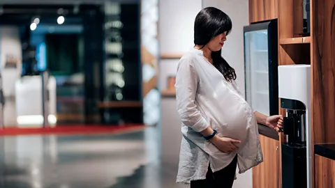 Getty Images Some pregnant employees report being left out of conversations or opportunities for advancement (Credit: Getty Images)