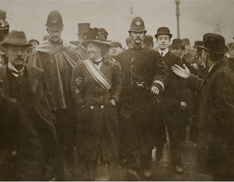 A photograph of Emily Wilding Davison being arrested by police