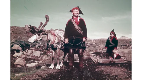 Finnish Heritage Agency In the past, Sámi children and their families roamed widely with their reindeer, as in this scene from the 1940s (Credit: Finnish Heritage Agency)