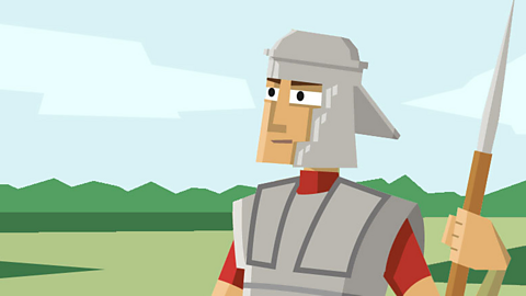 A roman soldier looks on.