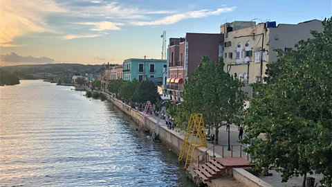 Brendan Sainsbury Colorful buildings align right looking left at the San Juan river