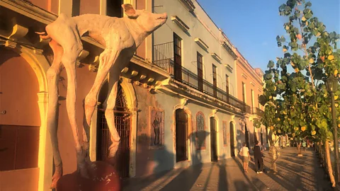 Brendan Sainsbury "Piggy Bank" by Dariel Lozano Pérez is one of many sculptures along Calle Narváez (Credit: Brendan Sainsbury)