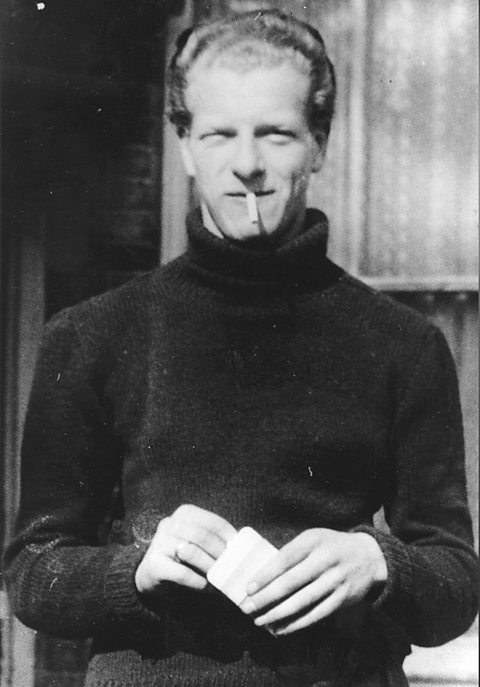 A photograph of Derek Bentley smoking a cigarette