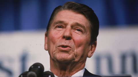 A photograph of President Ronald Reagan speaking