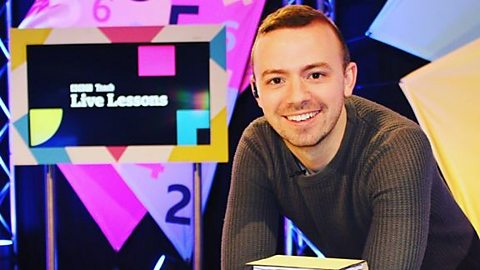 A photograph of Ryan Smith, a primary school teacher, on the set of Live Lessons. 