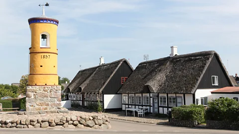 Getty Images The Danish island of Samsø generates all the energy it needs from its independently owned wind turbines (Credit: Getty Images)