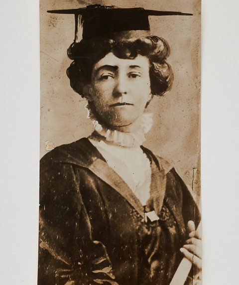 Emily Wilding Davison in a cap and gown.