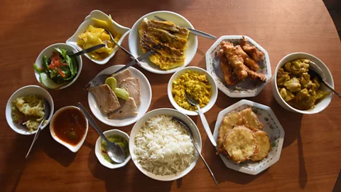 Anthony Ham The Creole set menu at Marie-Antoinette includes mango salad, seared tuna steaks, Creole chicken curry, aubergine fritters and other local dishes (Credit: Anthony Ham)