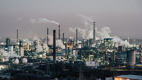 Smoke rising from factories into the air