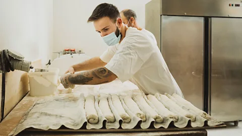 Getty Images Smaller companies have been incentivising workers with higher wages and benefits to keep them working, especially during the pandemic (Credit: Getty Images)