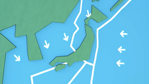 Arrows on tectonic plates pointing towards each other.