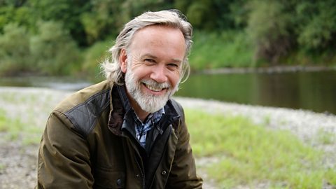 Marcus Wareing smiling next to a river