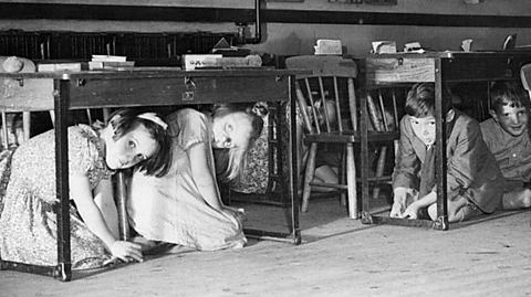 Children at school during an air raid drill