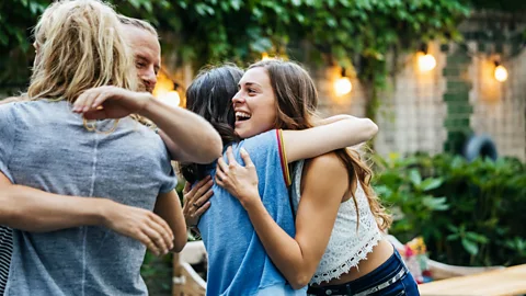 Getty Images Friends embrace (Credit: Getty Images)