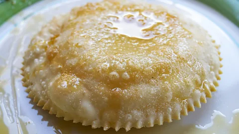 sal61/Getty Images Corbezzolo honey is often drizzled on seadas, a typical Sardinian dessert (Credit: sal61/Getty Images)