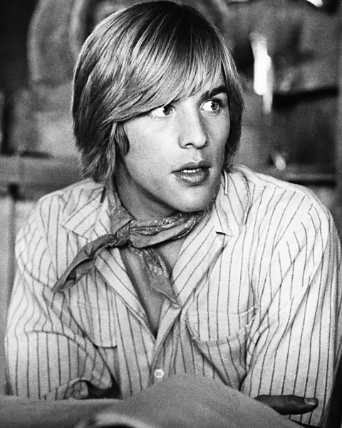 Alamy As Matthew, Don Johnson first appears shirtless and sweaty, wearing little but a blacksmith's smock (Credit: Alamy)