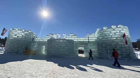 Karen Gardiner The ice fortress is the centrepiece of the 10-day Saranac Lake Winter Carnival (Credit: Karen Gardiner)