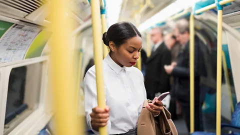 Getty Pay rises, commuting allowances and even raffles are some of the ways companies are incentivising workers to return to their office desks (Credit: Getty)