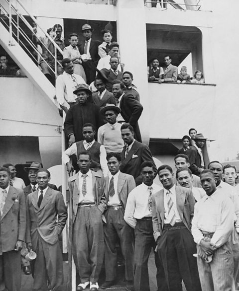 A black and white photograph of passengers on the Empire Windrush.