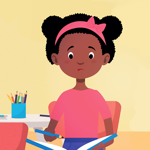 A picture of a child not focussing in school.