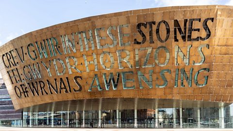 The Wales Millennium Centre in Cardiff with Welsh writing on it. 