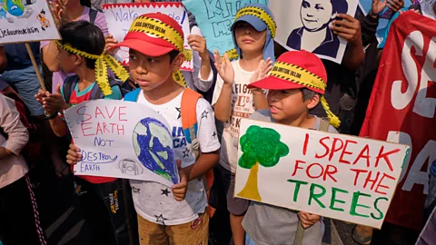 Ed Wray/Getty Images School children demonstrate in Jakarta, Indonesia. Fear of climate change has united young people all over the world (Credit: Ed Wray/Getty Images)