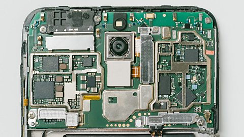 The inside of a smartphone showing its inner electronics