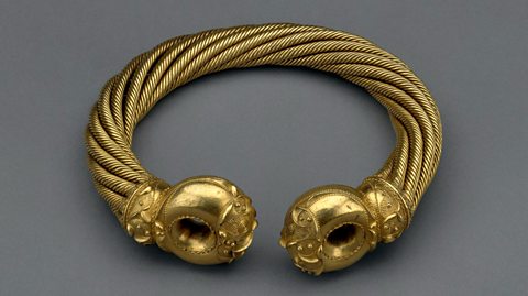 The Snettisham Great Torc, made of gold and found in Norfolk, England, on display at the British Museum.