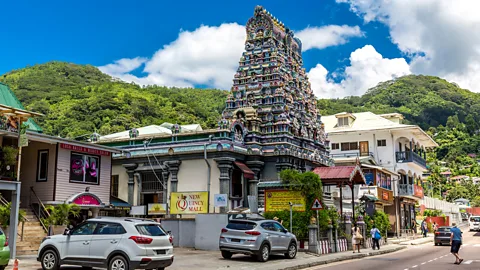 mauritius images GmbH/Alamy Stock Photo Victoria’s Hindu Sri Navasakthi Vinyagar Temple rises from the city (Credit: mauritius images GmbH/Alamy Stock Photo)