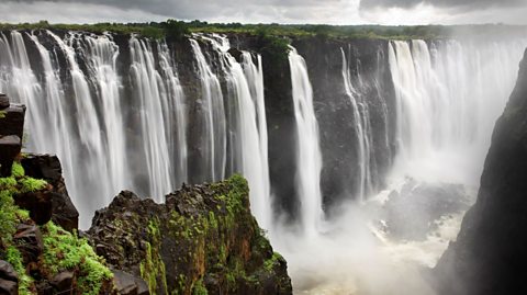 Victoria Falls is on the border between Zambia and Zimbabwe in Africa. 