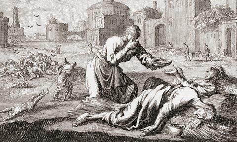 An engraving showing the Great Plague of London, 1665-1666. A passerby offers water to a man dying from the plague.