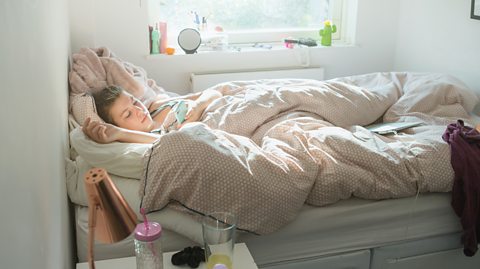 A girl sleeping in bed