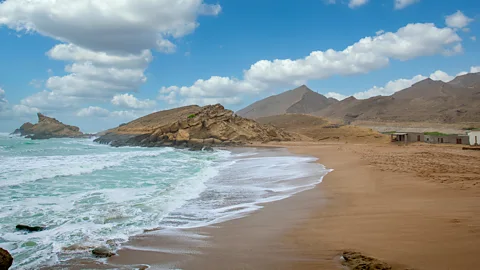 Muhammad Owais Khan/Getty Images Much of the Makran Coastal Highway runs along the cerulean Arabian Sea (Credit: Muhammad Owais Khan/Getty Images)
