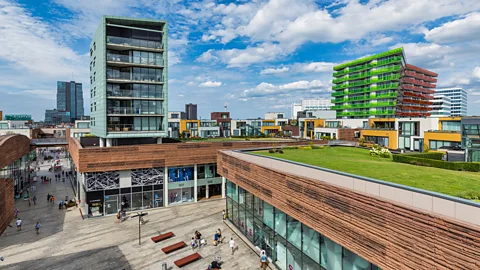 Visit Almere The split level architecture in Almere makes use of flat roofing to create green spaces for residential apartments (Credit: Visit Almere)