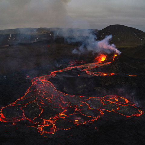 An aerial photograph of  volcano erupting