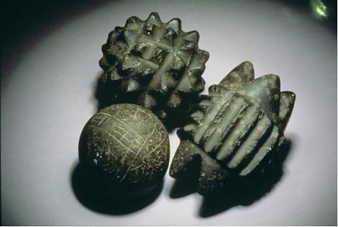 These beautifully carved stone objects may have been used in religious ceremonies.