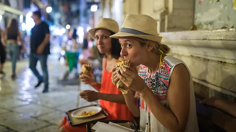 Getty Images Making a habit of eating large meals late at night can interfere with blood glucose levels (Credit: Getty Images)