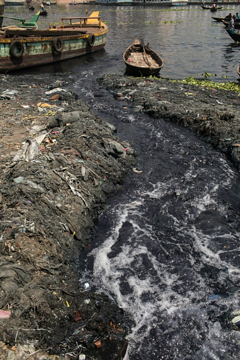 Water running down into a river.