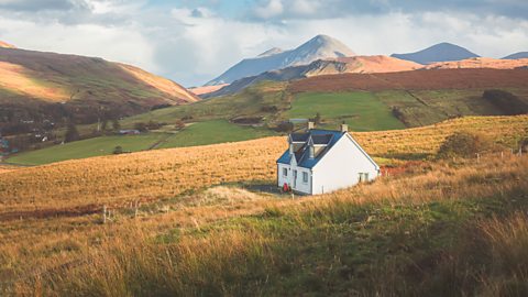 A house in the middle of the Scottish Highlands.