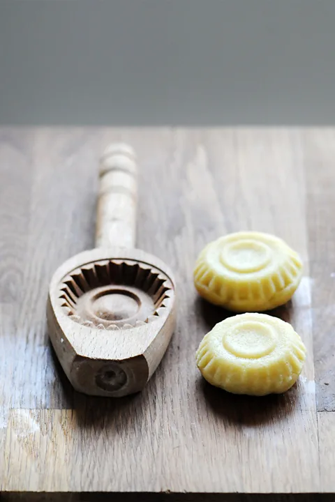 Aydan Ustkanat/Getty Images Maamoul shapes are often made by a wooden mould called a qalab (Credit: Aydan Ustkanat/Getty Images)