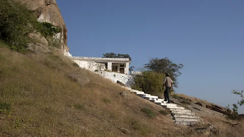 Sugato Mukherjee In the village of Peherwa, leopards can be seen near rock chambers and a small, rock-cut shrine (Credit: Sugato Mukherjee)