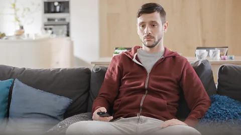 Getty Man watching TV