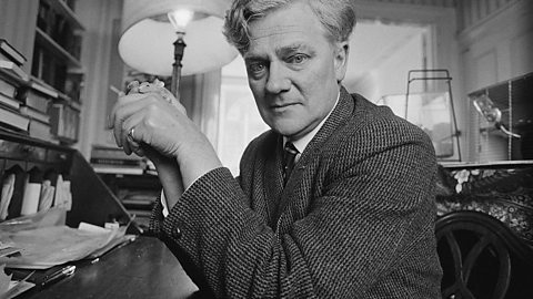 English novelist Richard Adams holding a pet mouse.