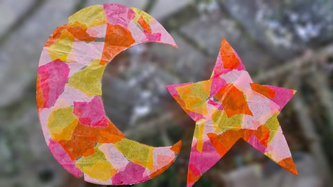 A star and moon suncatcher for Eid on a window