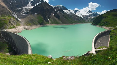 Kaprun Dam in Austria. It is a large body of water surrounded by mountains.