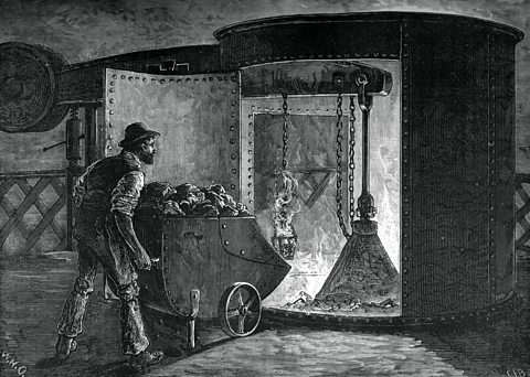 An engraving showing coal being added to a blast furnace at Govan Iron Works, Glasgow, c1880.