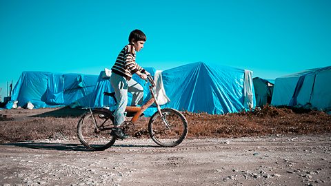 A Syrian child in a refugee camp