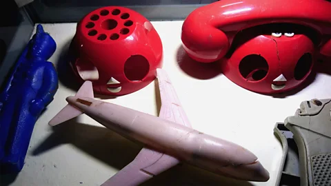 Mieczyslaw Zuk Besides toy guns, there are plastic figurines, miniature planes, tanks, telephones and other playthings (Credit: Mieczyslaw Zuk)